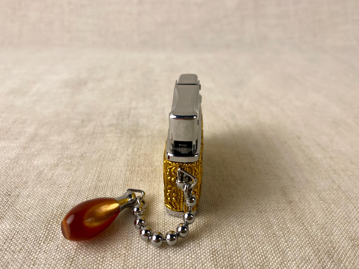 Vintage Sarome Baby Gas Lighter – Ornate Gold Tone with Red Cabochons – Boxed