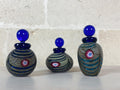 Trio di bottiglie da toeletta Peacock firmate Franco Moretti | Vetro artistico di Murano soffiato a mano